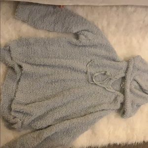 Oversized fuzzy sweater with hood